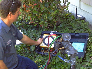 a Watauga irrigation repair professional is performing a backflow testing