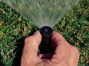 Our North Richland Hills Irrigation Repair team adjusts sprinkler heads
